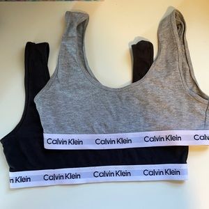 2 Calvin Klein bras, fits more like a small